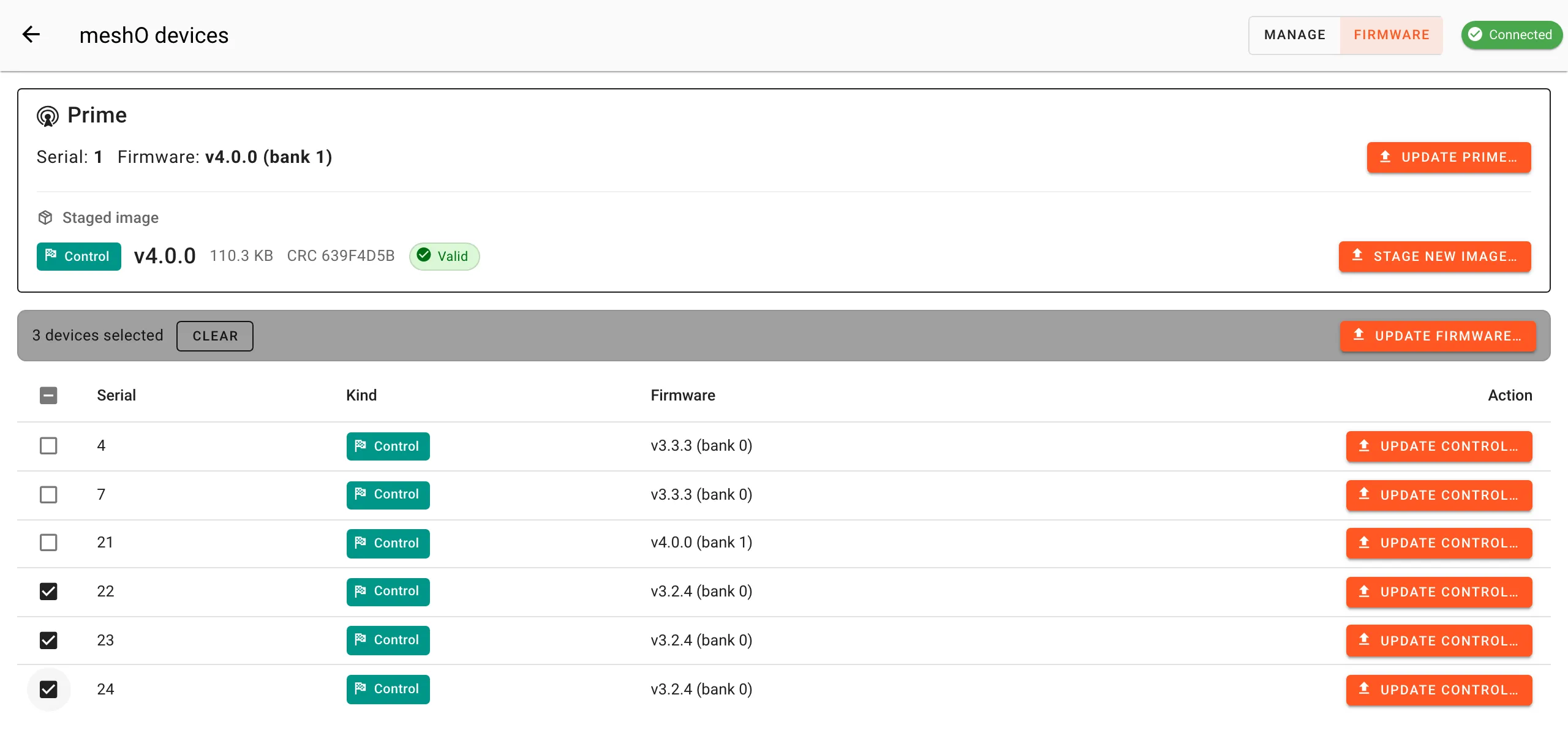 The Firmware view with Controls 22, 23 and 24 ticked. A bar above the table reads 3 devices selected, with Clear and Update firmware buttons. Control 21 now shows v4.0.0 (bank 1).