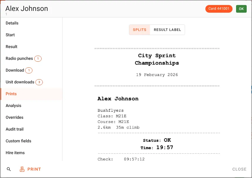 The Edit competitor dialog for Alex Johnson on its Prints tab, with a Splits and Result label switch at the top and a preview of the splits print below it: City Sprint Championships, 19 February 2026, Alex Johnson, Bushflyers, Class M21E, Course M21E, 2.6 km, 35 m climb, Status OK, Time 19:57, Check 09:57:12. A Print button sits at the bottom left.