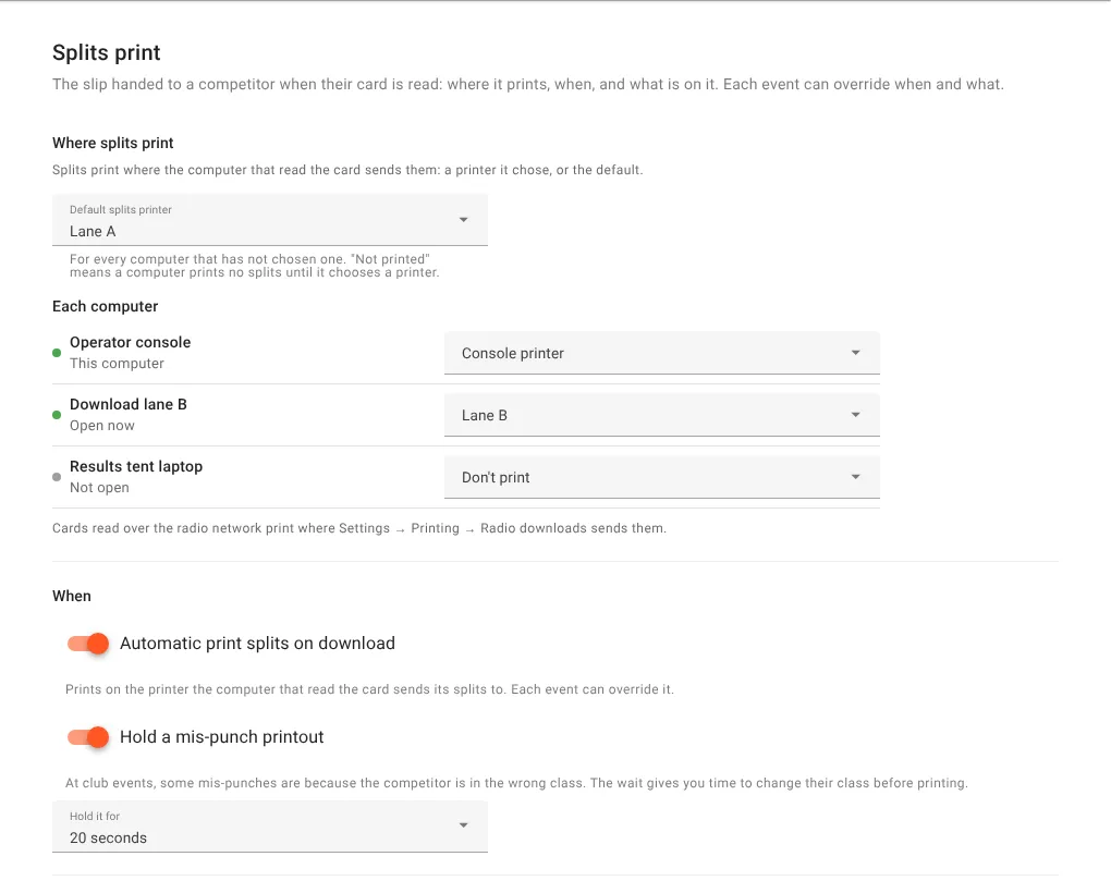 Settings, Printing, Splits print. Where splits print: Default splits printer set to Lane A, then Each computer, listing Operator console on Console printer, Download lane B on Lane B and Results tent laptop on Don't print. A note says cards read over the radio network print where Settings, Printing, Radio downloads sends them. When: Automatic print splits on download, on; Hold a mis-punch printout, on; Hold it for 20 seconds. Layout: Print meshO logo, Print top 3 places on splits, Print mistakes on splits and Print strong legs on splits, all on, and Splits language, Same as display language.