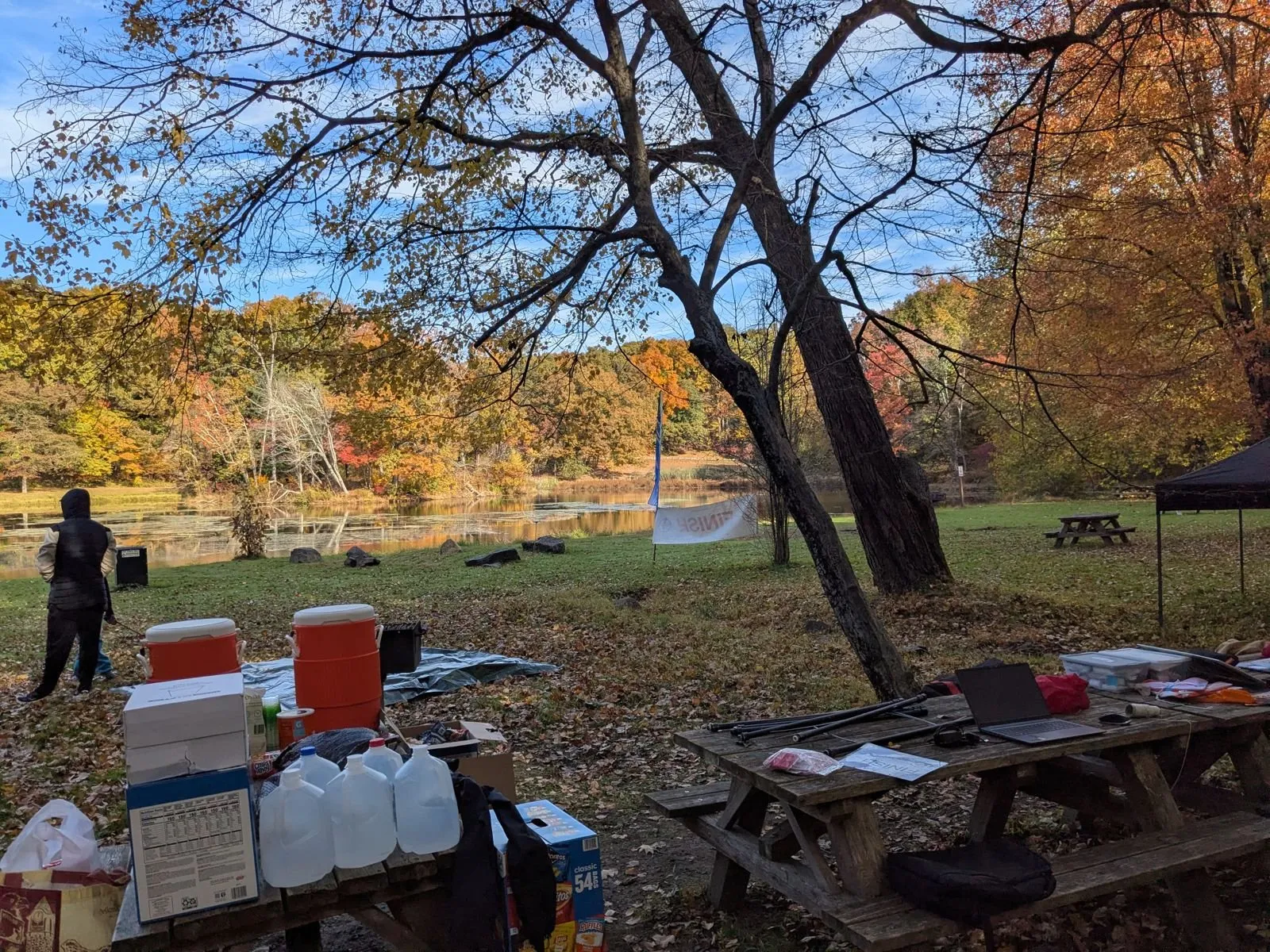 The arena by the lake, with tables and gear set up