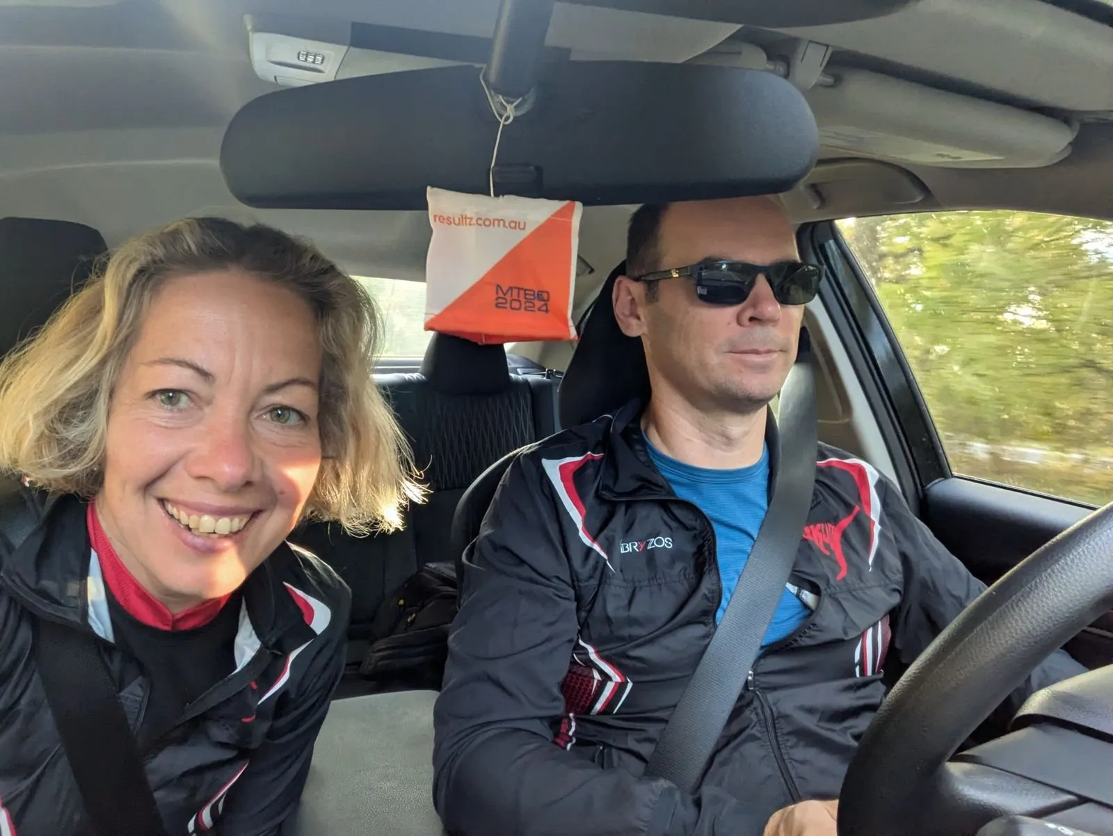 Marina and Fedor in the car on the way to the event